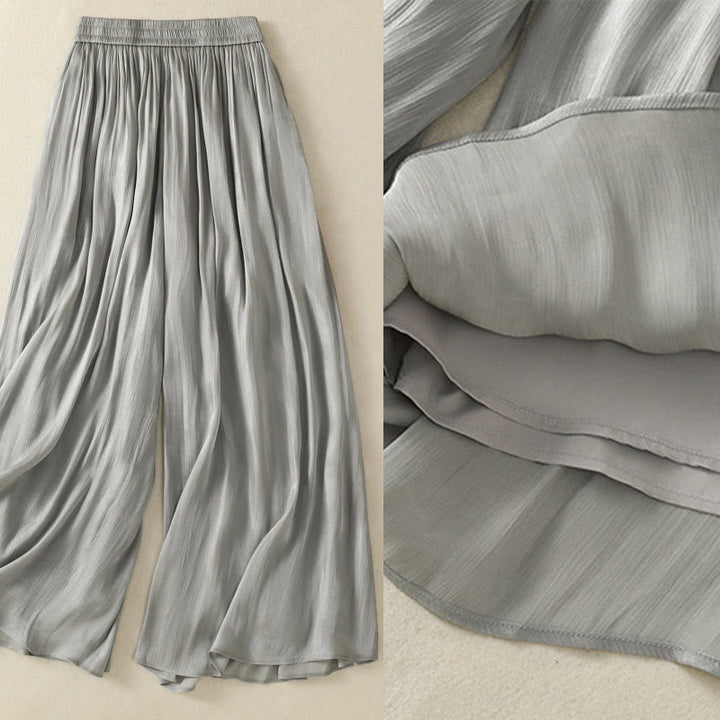 Pantaloni larghi da donna con elastico in vita, modello plissettato grigio chiaro, con tasche e motivo Buddha Stones - image 4