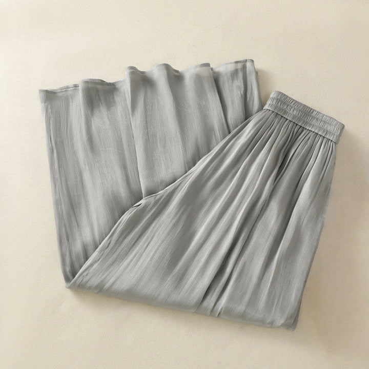 Pantaloni larghi da donna con elastico in vita, modello plissettato grigio chiaro, con tasche e motivo Buddha Stones - image 2