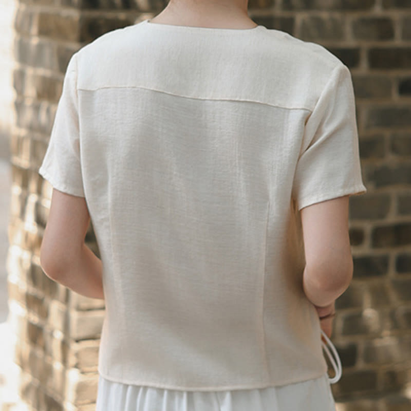 Camicia da donna a maniche corte in cotone e lino con scollo a V, motivo irregolare con bottoni Buddha Stones - image 15