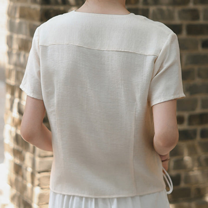 Camicia da donna a maniche corte in cotone e lino con scollo a V, motivo irregolare con bottoni Buddha Stones - image 15