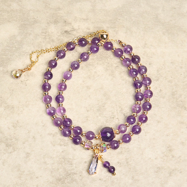 Bracciale multistrato in perle di ametista naturale Buddha Stones