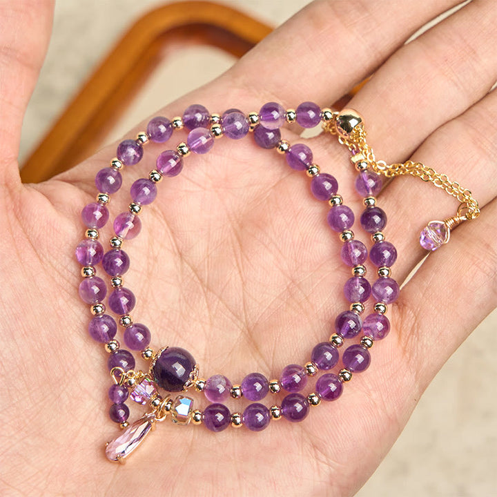 Bracciale multistrato in perle di ametista naturale Buddha Stones
