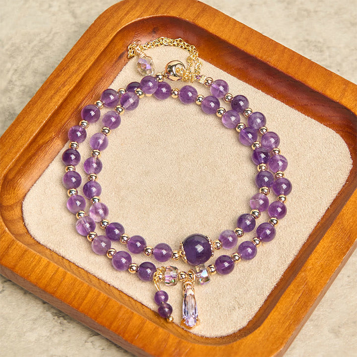 Bracciale multistrato in perle di ametista naturale Buddha Stones