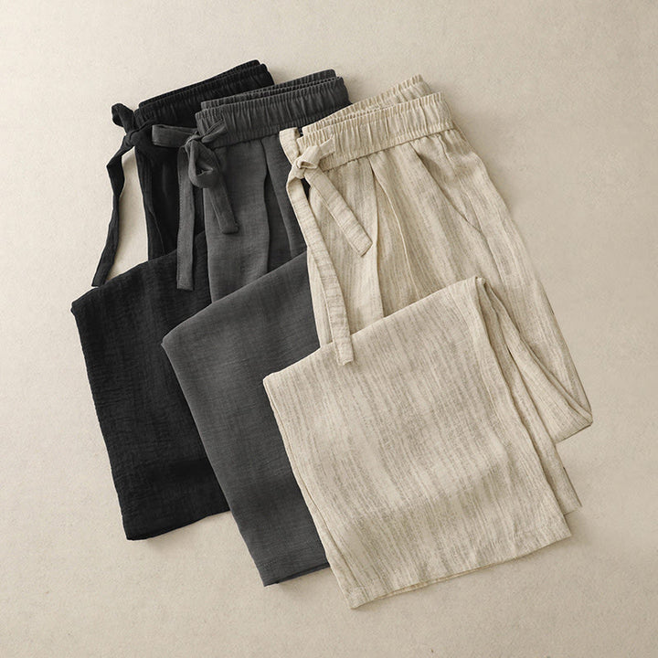Pantaloni da donna in cotone a gamba larga con tasche, modello Buddha Stones, casual, estivi, con lacci e texture.