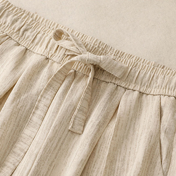 Pantaloni da donna in cotone a gamba larga con tasche, modello Buddha Stones, casual, estivi, con lacci e texture.
