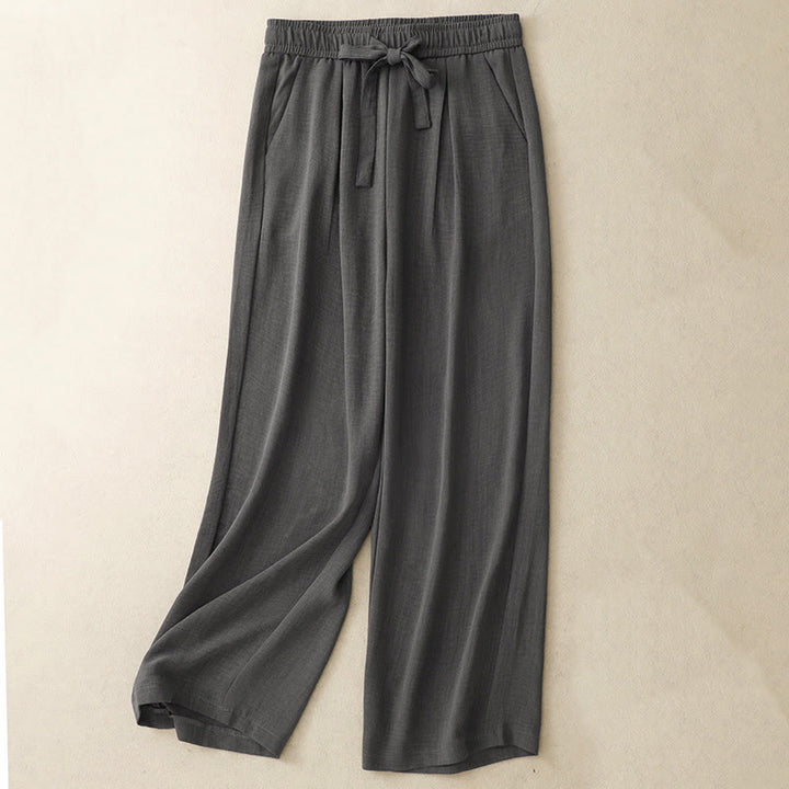 Pantaloni da donna in cotone a gamba larga con tasche, modello Buddha Stones, casual, estivi, con lacci e texture.