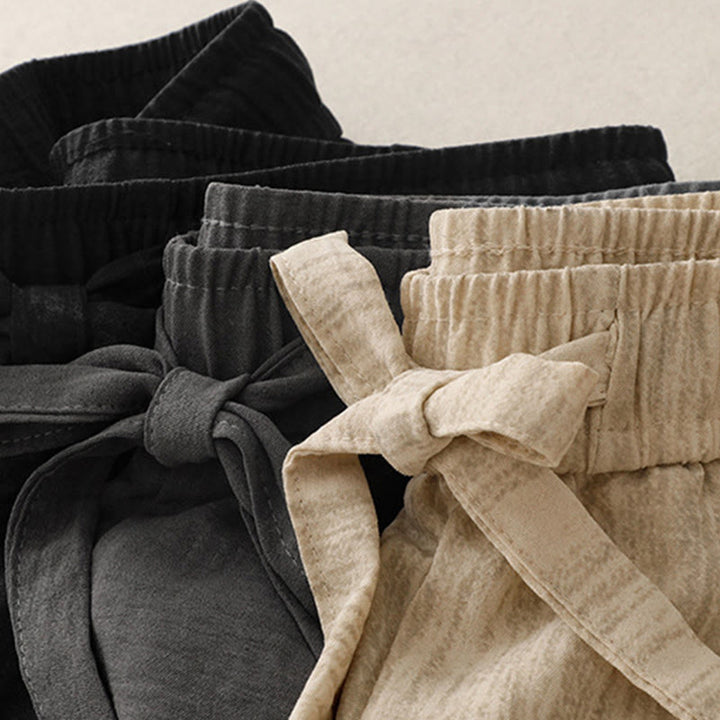 Pantaloni da donna in cotone a gamba larga con tasche, modello Buddha Stones, casual, estivi, con lacci e texture.