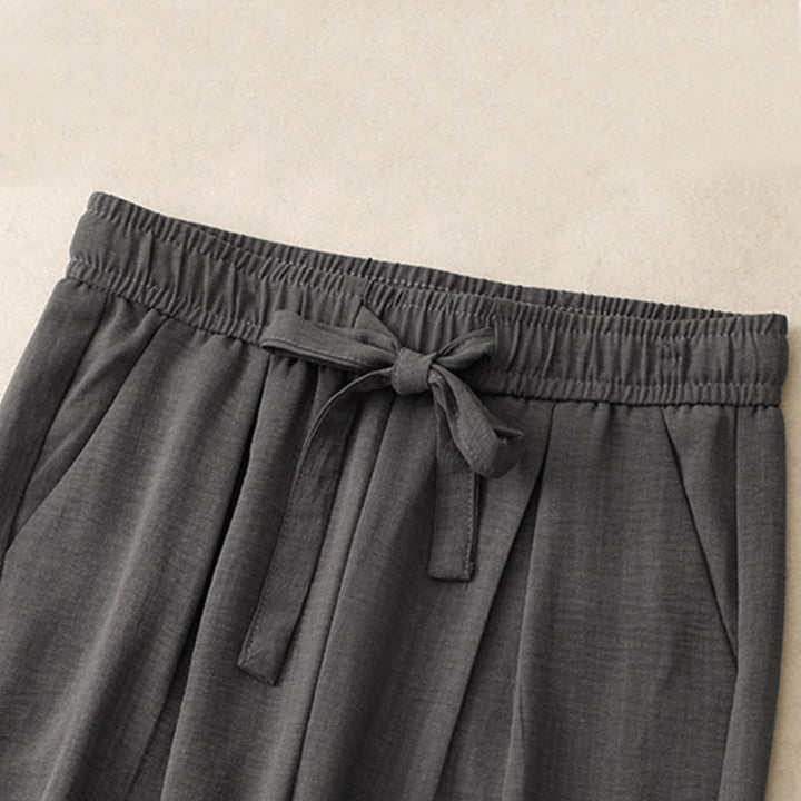 Pantaloni da donna in cotone a gamba larga con tasche, modello Buddha Stones, casual, estivi, con lacci e texture.
