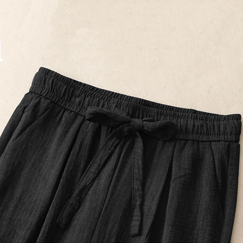 Pantaloni da donna in cotone a gamba larga con tasche, modello Buddha Stones, casual, estivi, con lacci e texture.