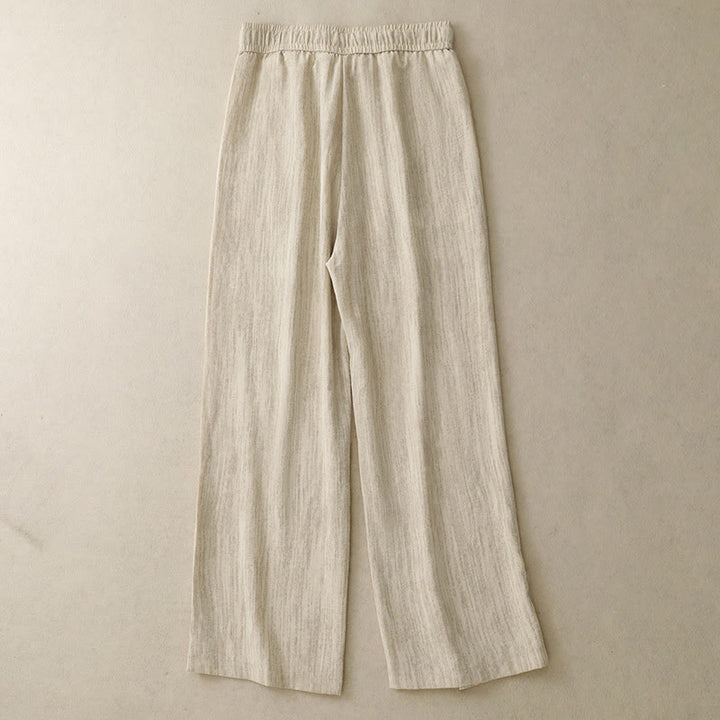 Pantaloni da donna in cotone a gamba larga con tasche, modello Buddha Stones, casual, estivi, con lacci e texture.