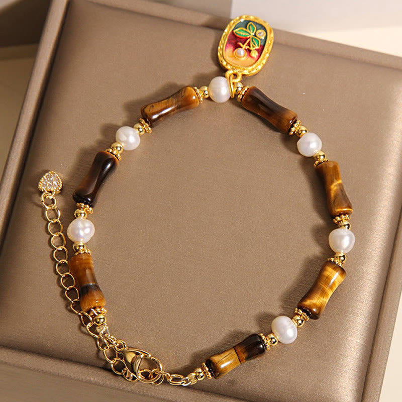 Bracciale Buddha Stones in bambù naturale con occhio di tigre e perle - image 5