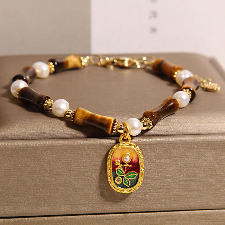 Bracciale Buddha Stones in bambù naturale con occhio di tigre e perle - image 3