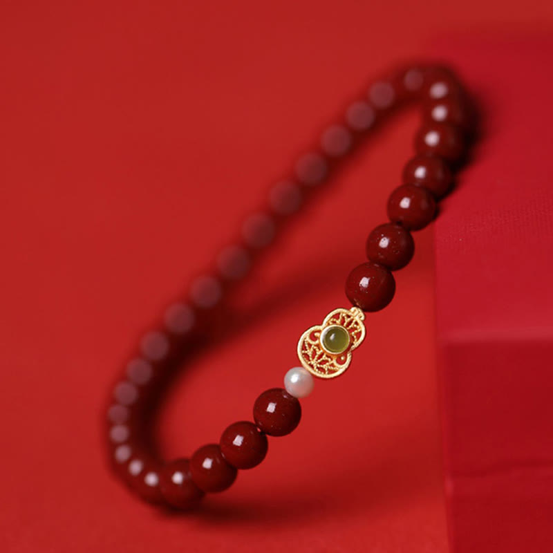 Braccialetto di perle di cinabro e zucca con Buddha Stones e perle di benedizione - Cinabro di zucca (dimensione perla: 6 mm) - image 1