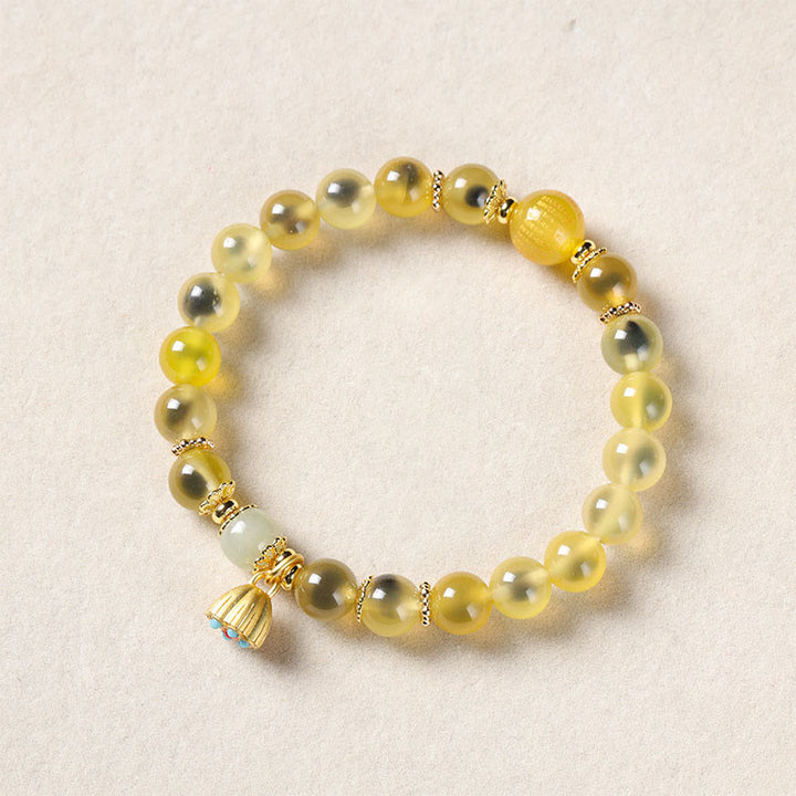 Braccialetto curativo con baccello di loto dorato in agata caramellata naturale colorata Buddha Stones - Agata gialla caramella (circonferenza del polso: 14-15 cm) - image 9