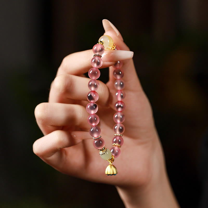 Braccialetto curativo con baccello di loto dorato in agata caramellata naturale colorata Buddha Stones - image 16