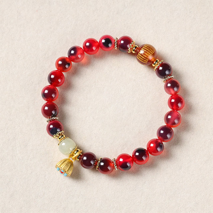 Braccialetto curativo con baccello di loto dorato in agata caramellata naturale colorata Buddha Stones - image 17