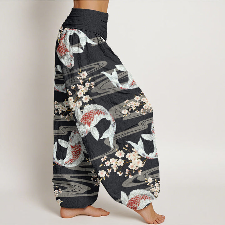 Pantaloni harem da donna con elastico in vita, in cotone, casual, con motivo a fiori di ciliegio e pesci koi, motivo Buddha Stones - image 1