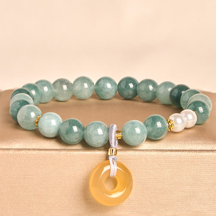 Bracciale della prosperità con perle e fibbia della pace in giada blu Buddha Stones