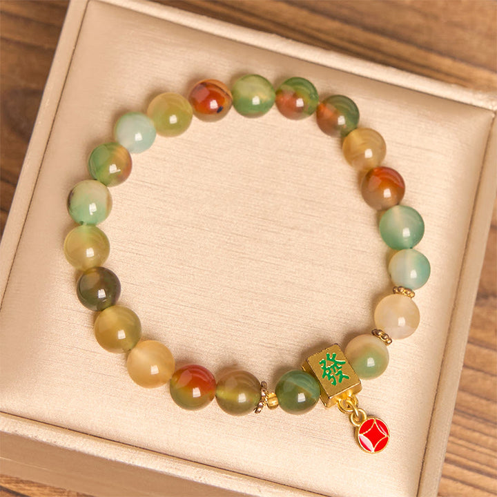 Braccialetto del coraggio con moneta in agata pavone naturale Buddha Stones