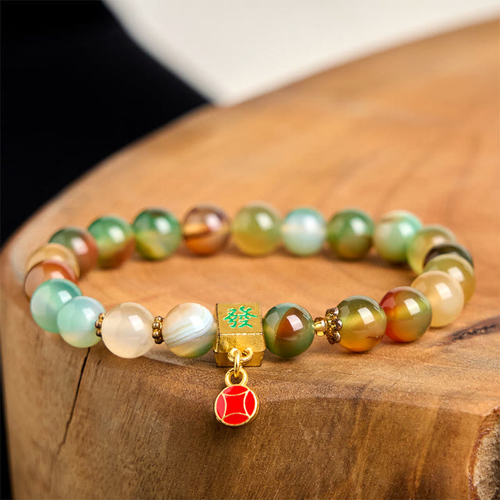 Braccialetto del coraggio con moneta in agata pavone naturale Buddha Stones