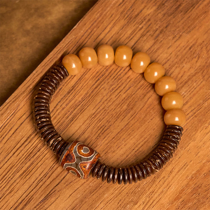 Bracciale della saggezza con perline di Dzi, semi di Bodhi tibetani , Buddha Stones e guscio di cocco