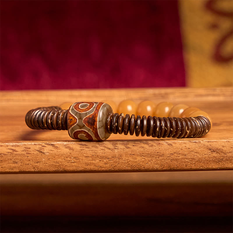 Bracciale della saggezza con perline di Dzi, semi di Bodhi tibetani , Buddha Stones e guscio di cocco
