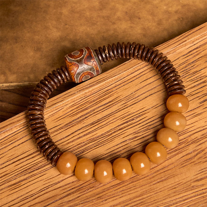 Bracciale della saggezza con perline di Dzi, semi di Bodhi tibetani , Buddha Stones e guscio di cocco