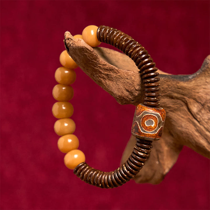 Bracciale della saggezza con perline di Dzi, semi di Bodhi tibetani , Buddha Stones e guscio di cocco