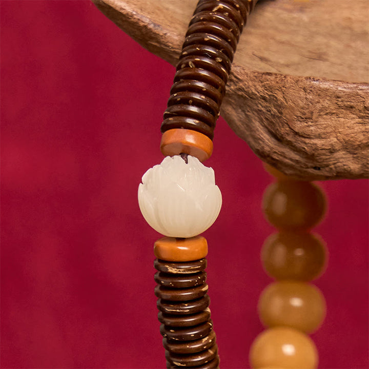 Bracciale della saggezza con perline di Dzi, semi di Bodhi tibetani , Buddha Stones e guscio di cocco