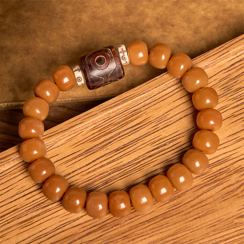 Bracciale con perline Dzi e semi di Bodhi tibetani di Buddha Stones, per tenere lontani gli spiriti maligni