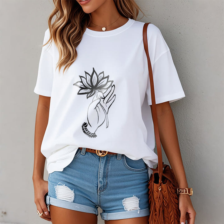 Maglietta casual in cotone con motivo a fiori di loto e mano che regge Buddha Stones - image 8
