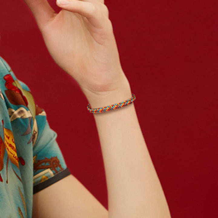 Bracciale intrecciato con corda colorata e nodo della pace a otto fili in argento sterling 925 Buddha Stones - image 11