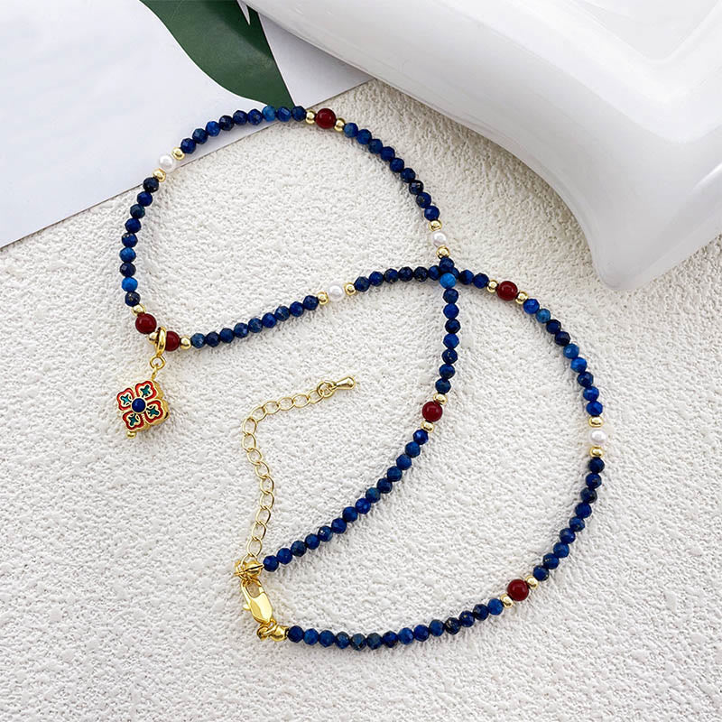 Collana con ciondolo positivo in perle di lazurite e pietre Buddha Stones - image 4
