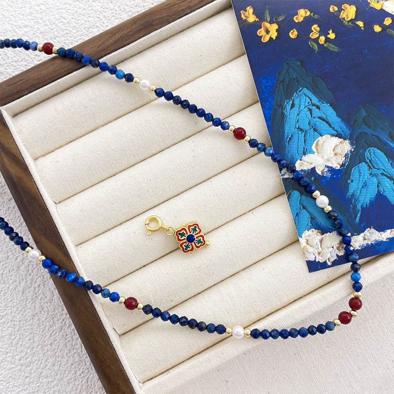 Collana con ciondolo positivo in perle di lazurite e pietre Buddha Stones - image 3