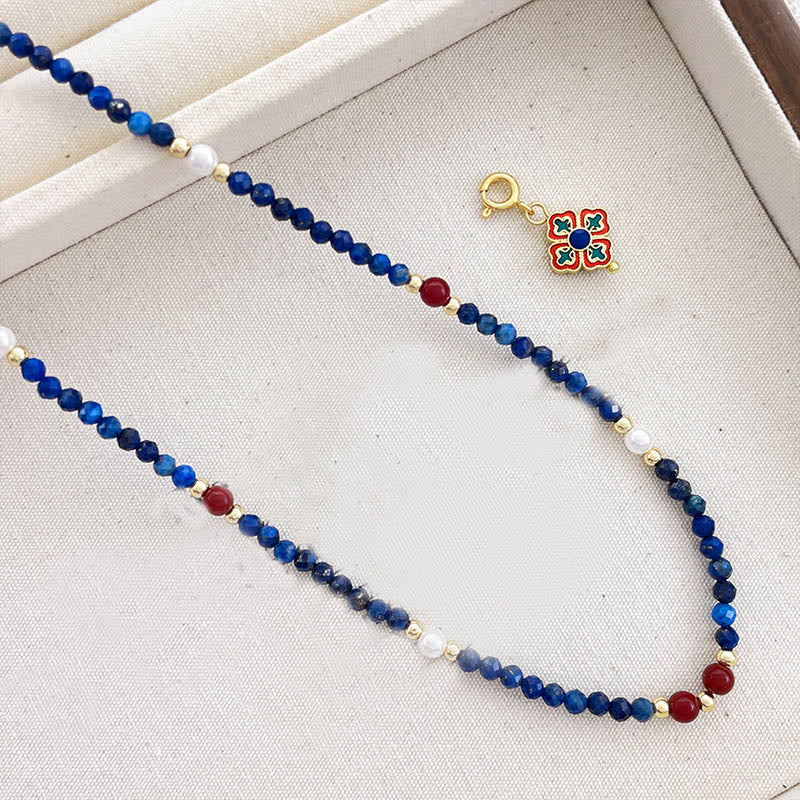 Collana con ciondolo positivo in perle di lazurite e pietre Buddha Stones - image 9
