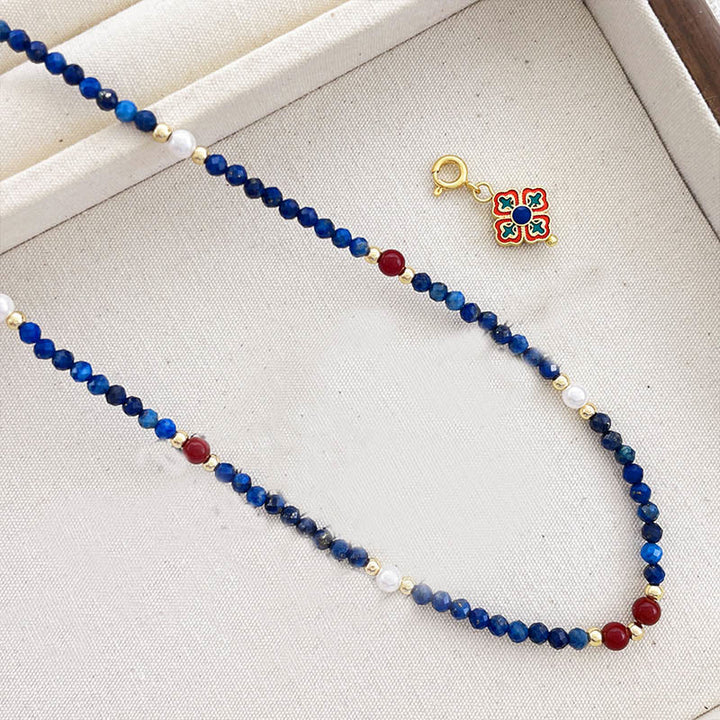 Collana con ciondolo positivo in perle di lazurite e pietre Buddha Stones - image 9