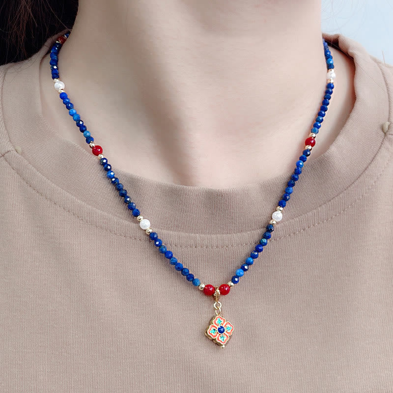 Collana con ciondolo positivo in perle di lazurite e pietre Buddha Stones - image 5