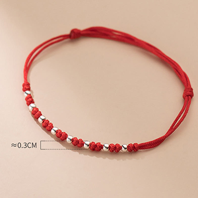 Braccialetto portafortuna regolabile con perline in argento sterling 925 e cordino rosso Buddha Stones - image 10