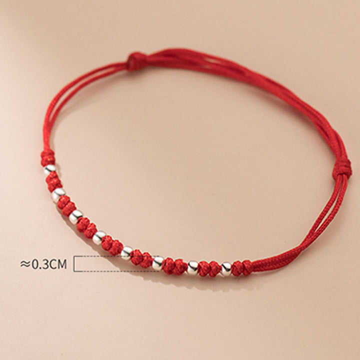 Braccialetto portafortuna regolabile con perline in argento sterling 925 e cordino rosso Buddha Stones - image 10