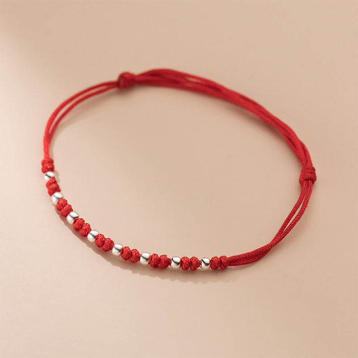 Braccialetto portafortuna regolabile con perline in argento sterling 925 e cordino rosso Buddha Stones - image 8
