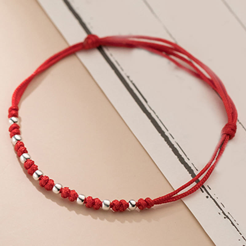 Braccialetto portafortuna regolabile con perline in argento sterling 925 e cordino rosso Buddha Stones - image 10