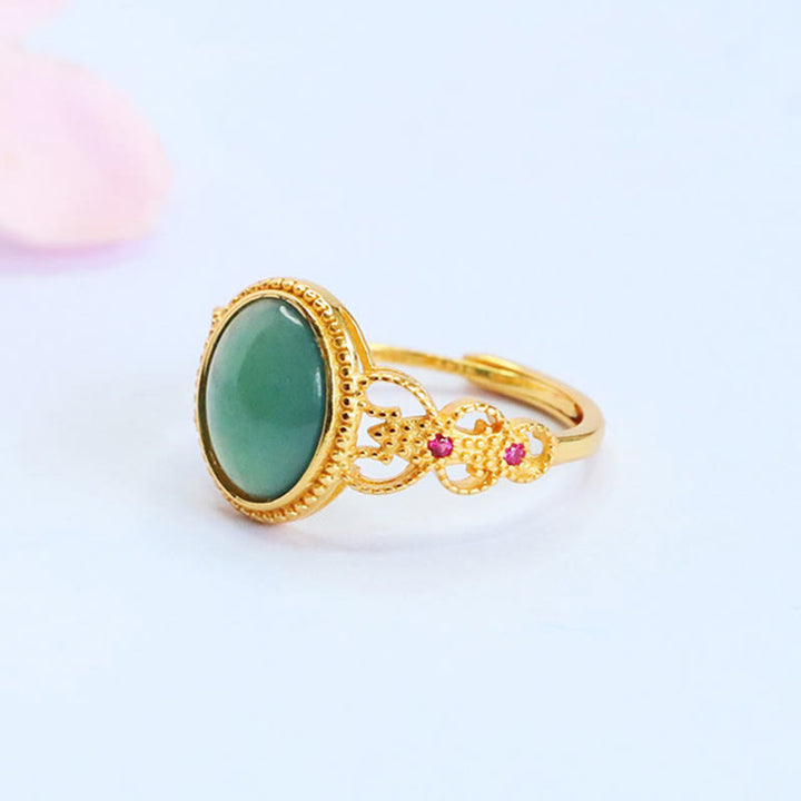 Anello portafortuna in giada con design cavo, placcato in oro e argento sterling 925 naturale Buddha Stones - image 1