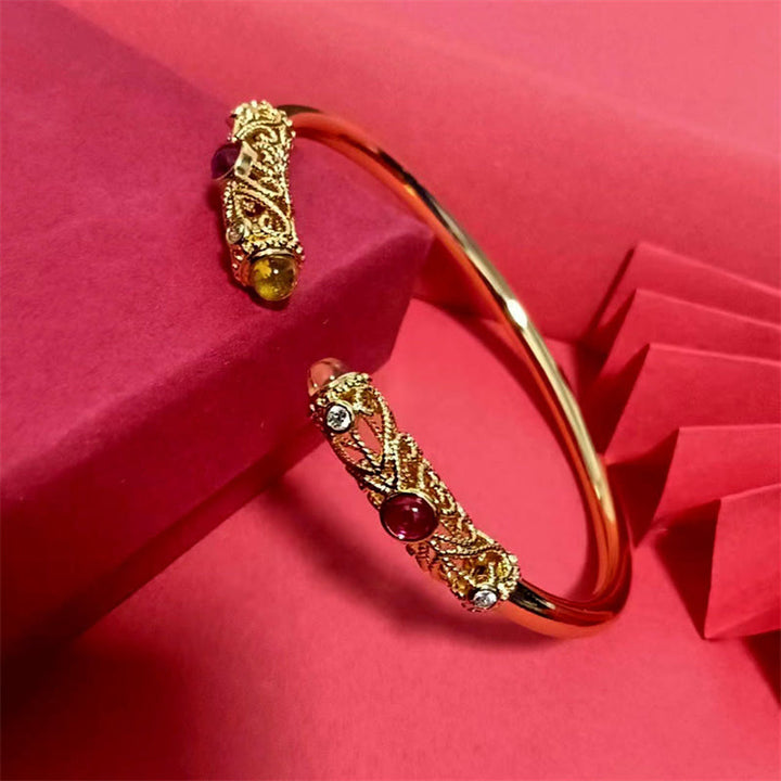 Bracciale rigido con motivo floreale Buddha Stones, zircone rosso, ambra e rame portafortuna - image 8