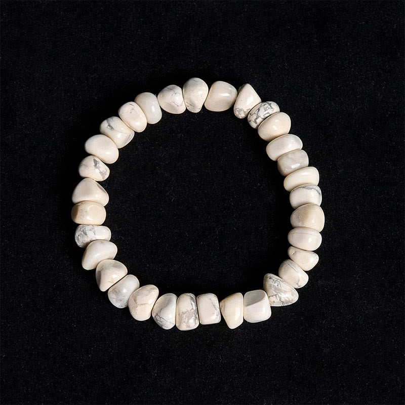 Braccialetto del coraggio con blocchi irregolari di turchese bianco e Buddha Stones