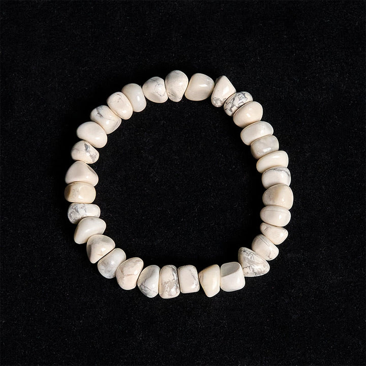 Braccialetto del coraggio con blocchi irregolari di turchese bianco e Buddha Stones