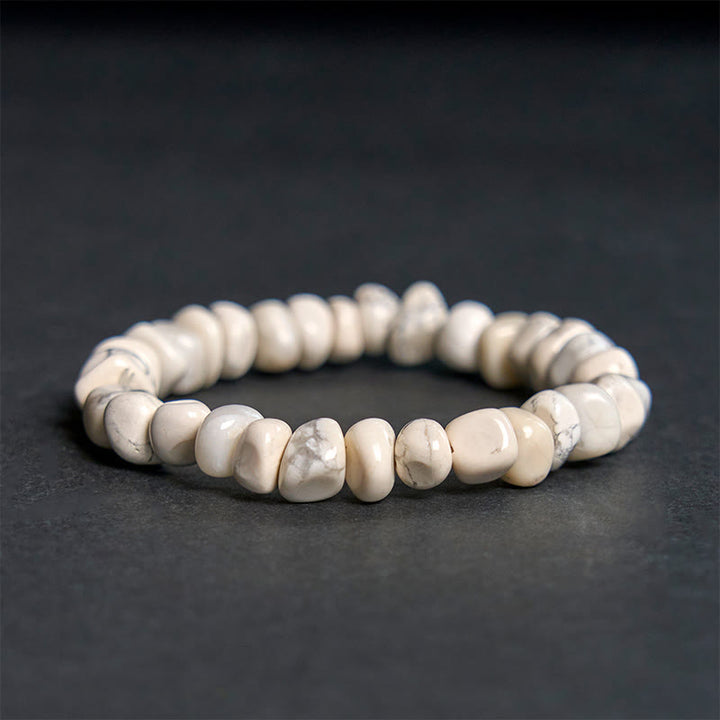 Braccialetto del coraggio con blocchi irregolari di turchese bianco e Buddha Stones