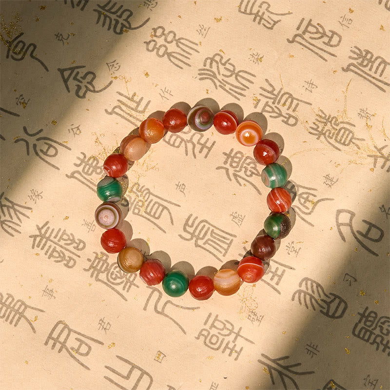 Bracciale Buddha Stones in agata naturale dell'Alashan per la fiducia