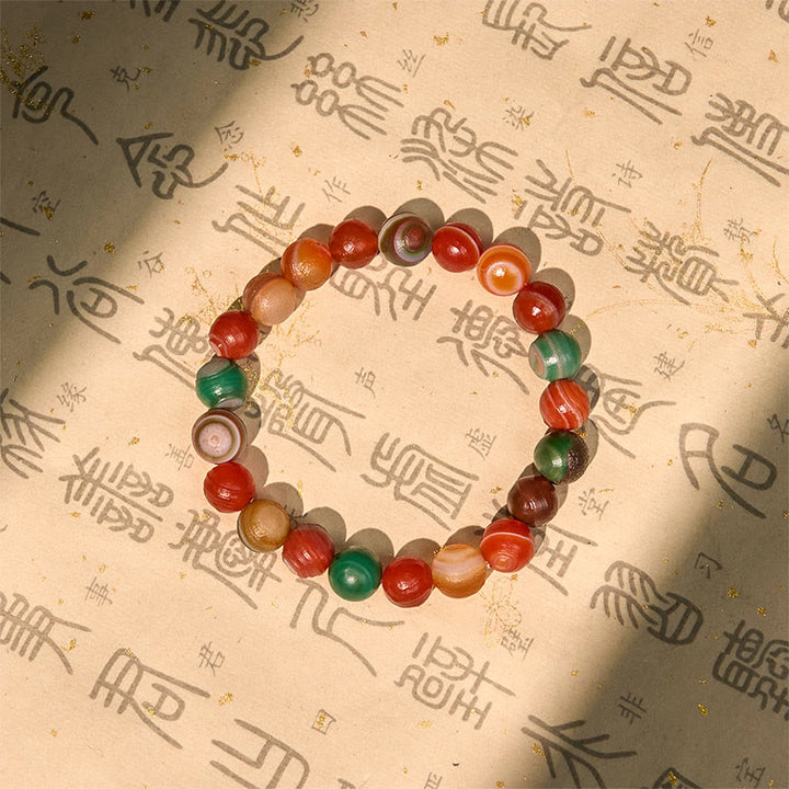 Bracciale Buddha Stones in agata naturale dell'Alashan per la fiducia