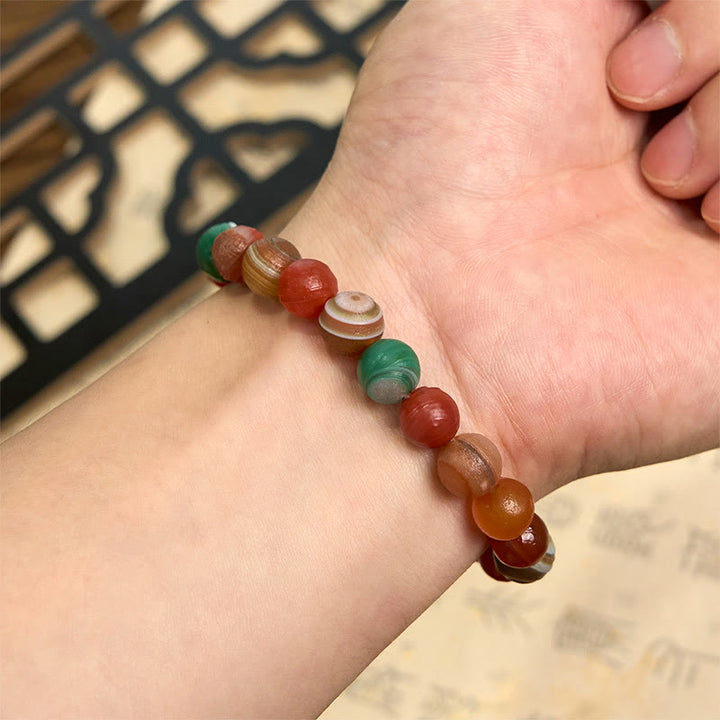 Bracciale Buddha Stones in agata naturale dell'Alashan per la fiducia