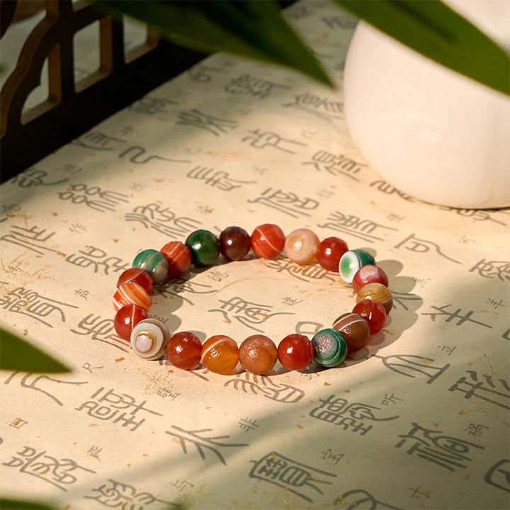 Bracciale Buddha Stones in agata naturale dell'Alashan per la fiducia